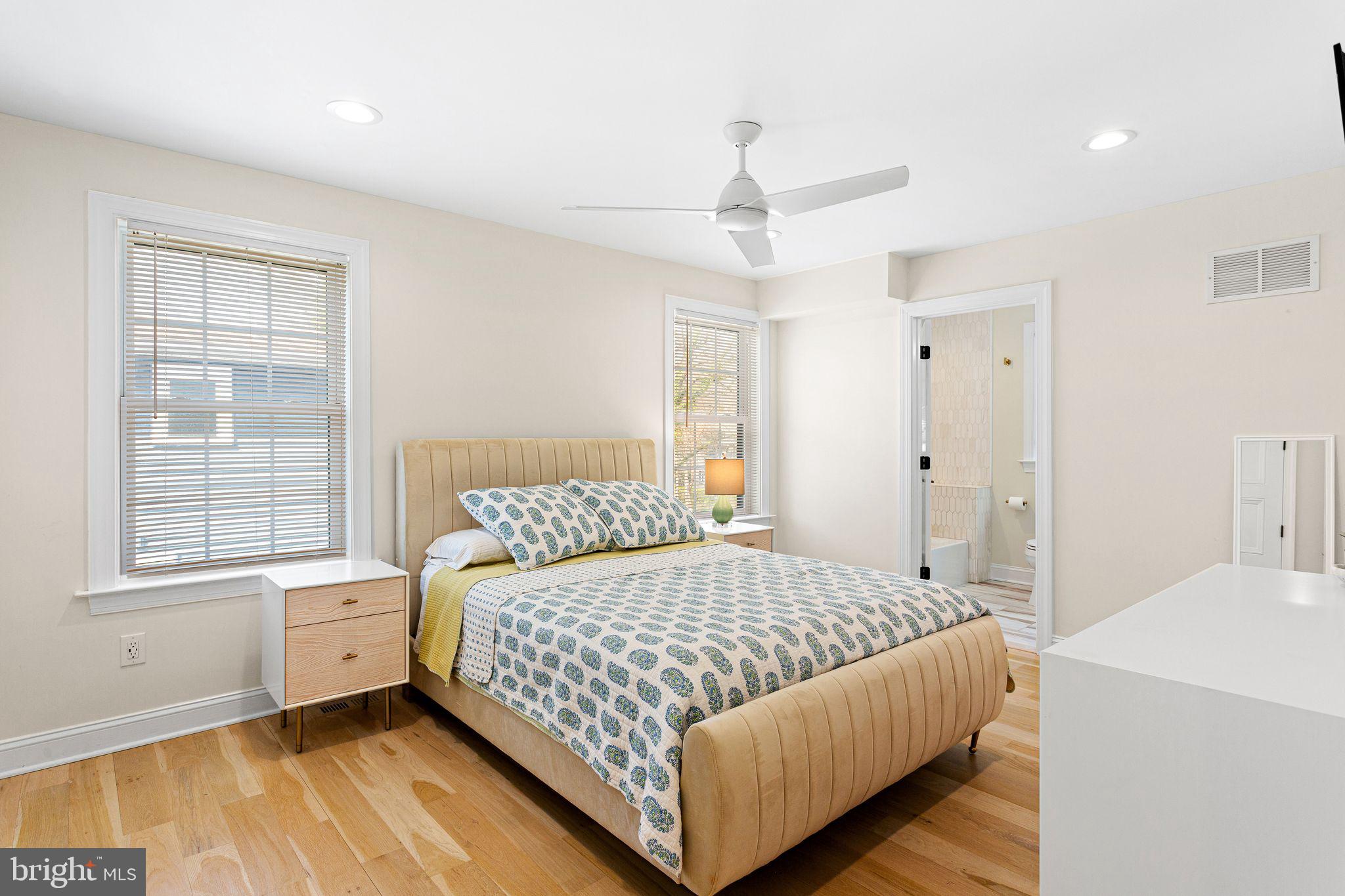 305 Grove Street Haddonfield, NJ 08033 - Photo 23 of 45 a bedroom with a bed and a window