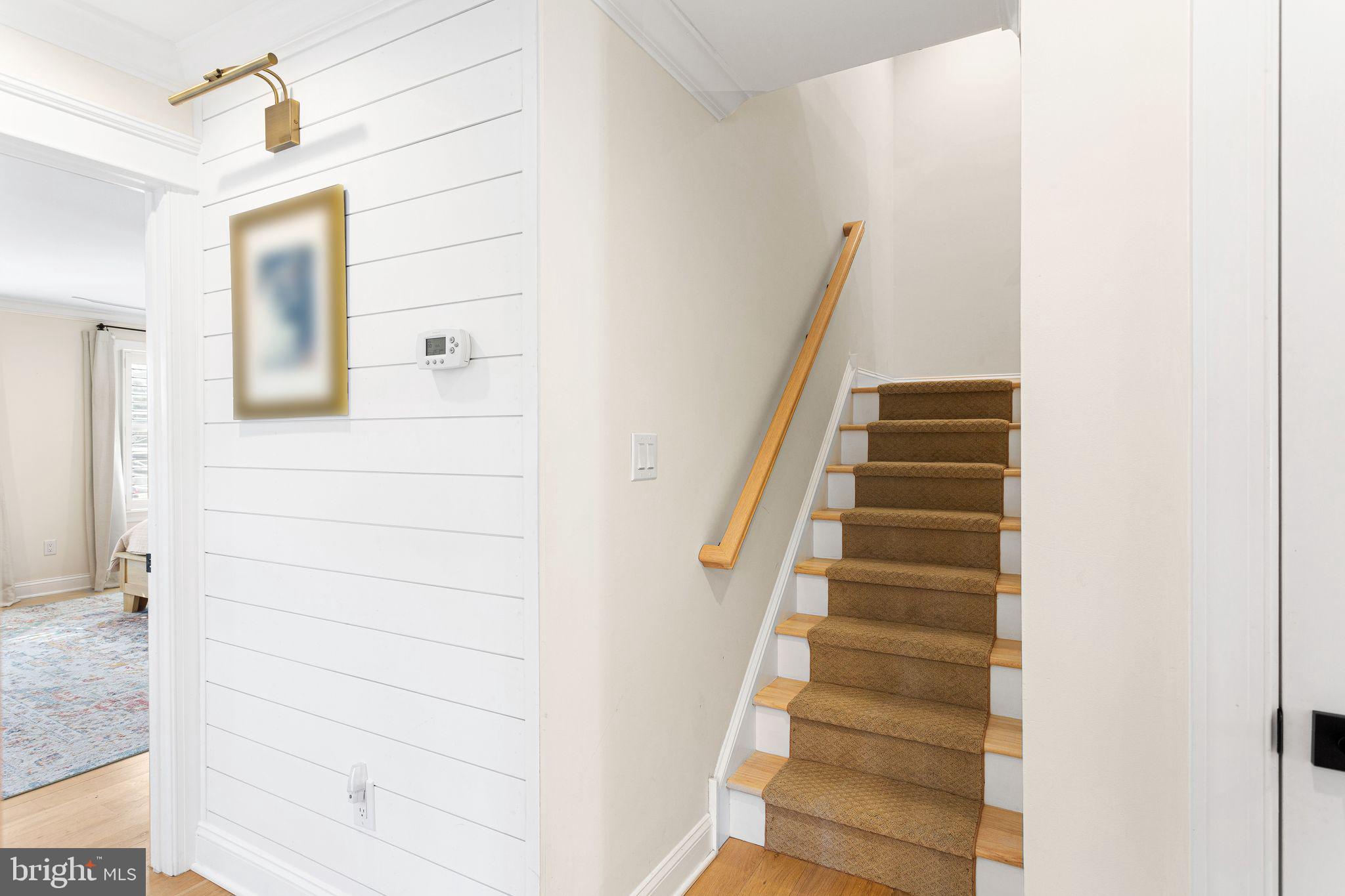 305 Grove Street Haddonfield, NJ 08033 - Photo 29 of 45 a view of staircase with white walls and windows
