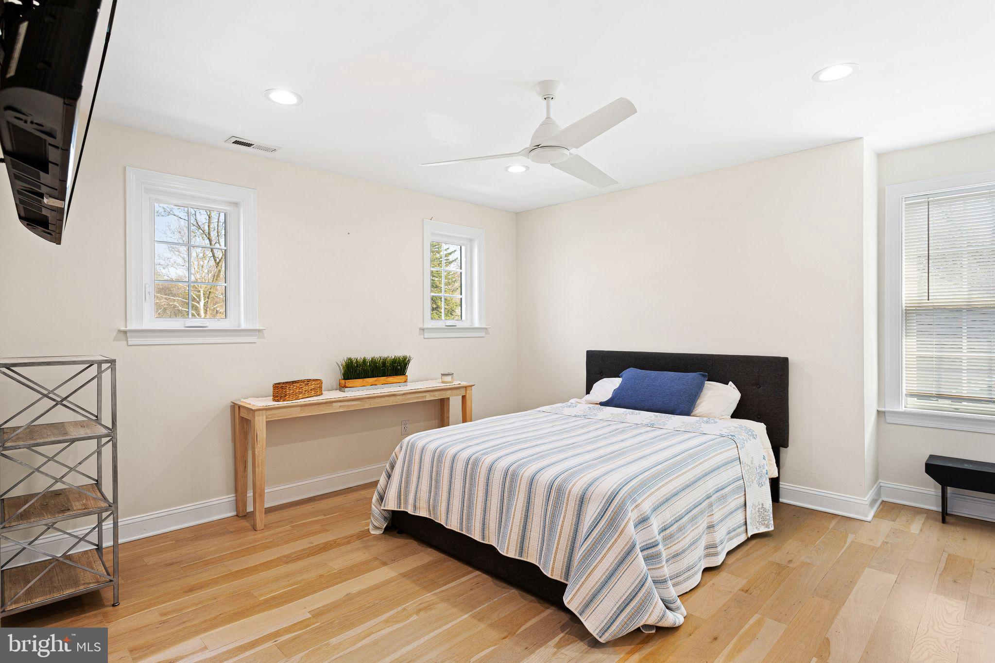 305 Grove Street Haddonfield, NJ 08033 - Photo 31 of 45 a bedroom with a bed and a desk