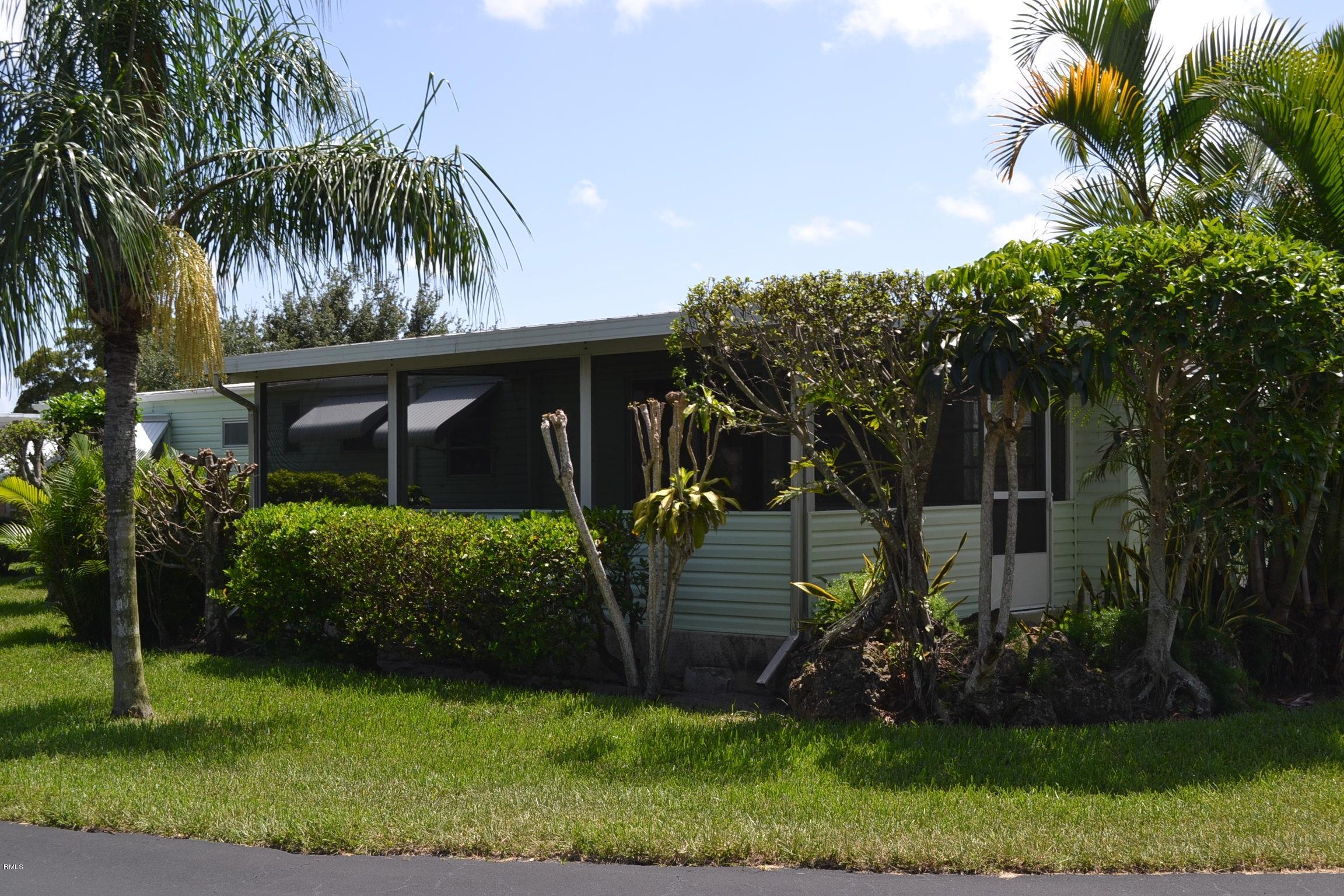 8332 Chisum Trail Boca Raton, FL 33433 - Photo 3 of 25 Side View - Screened Porch