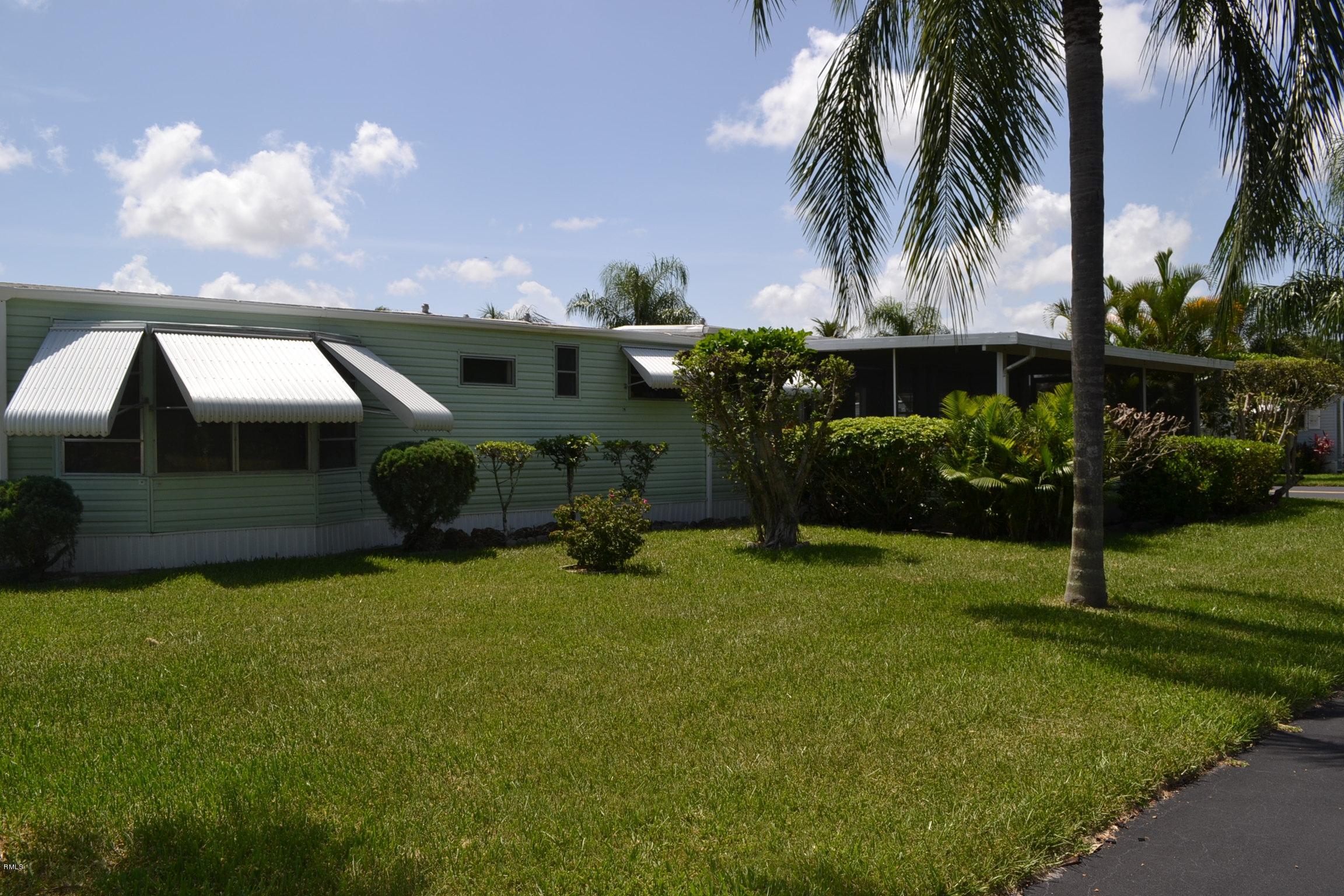8332 Chisum Trail Boca Raton, FL 33433 - Photo 4 of 25 Side View 2