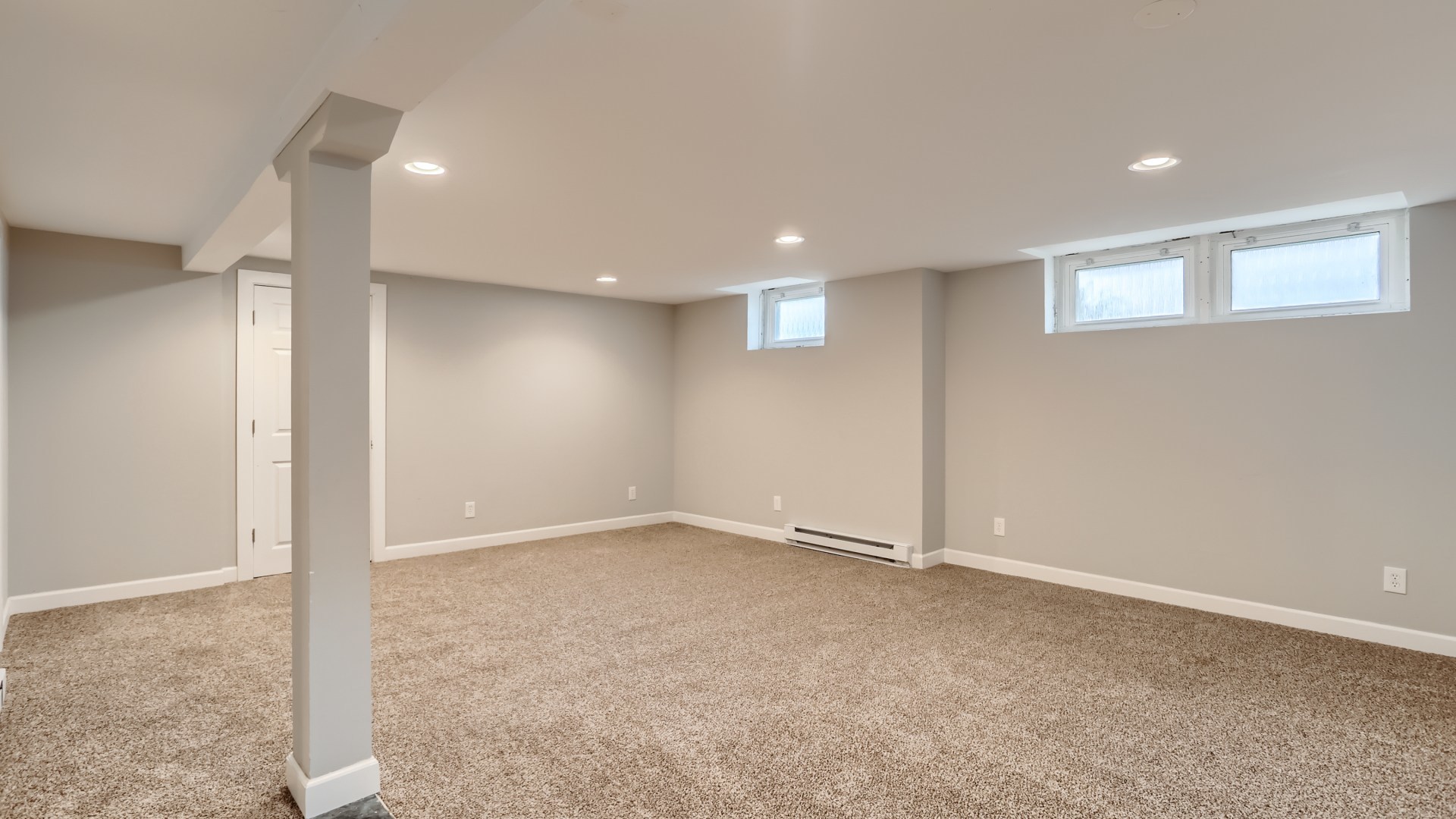 940 Logan Avenue Elgin, IL 60120 - Photo 11 of 16 an empty room with entrance and windows