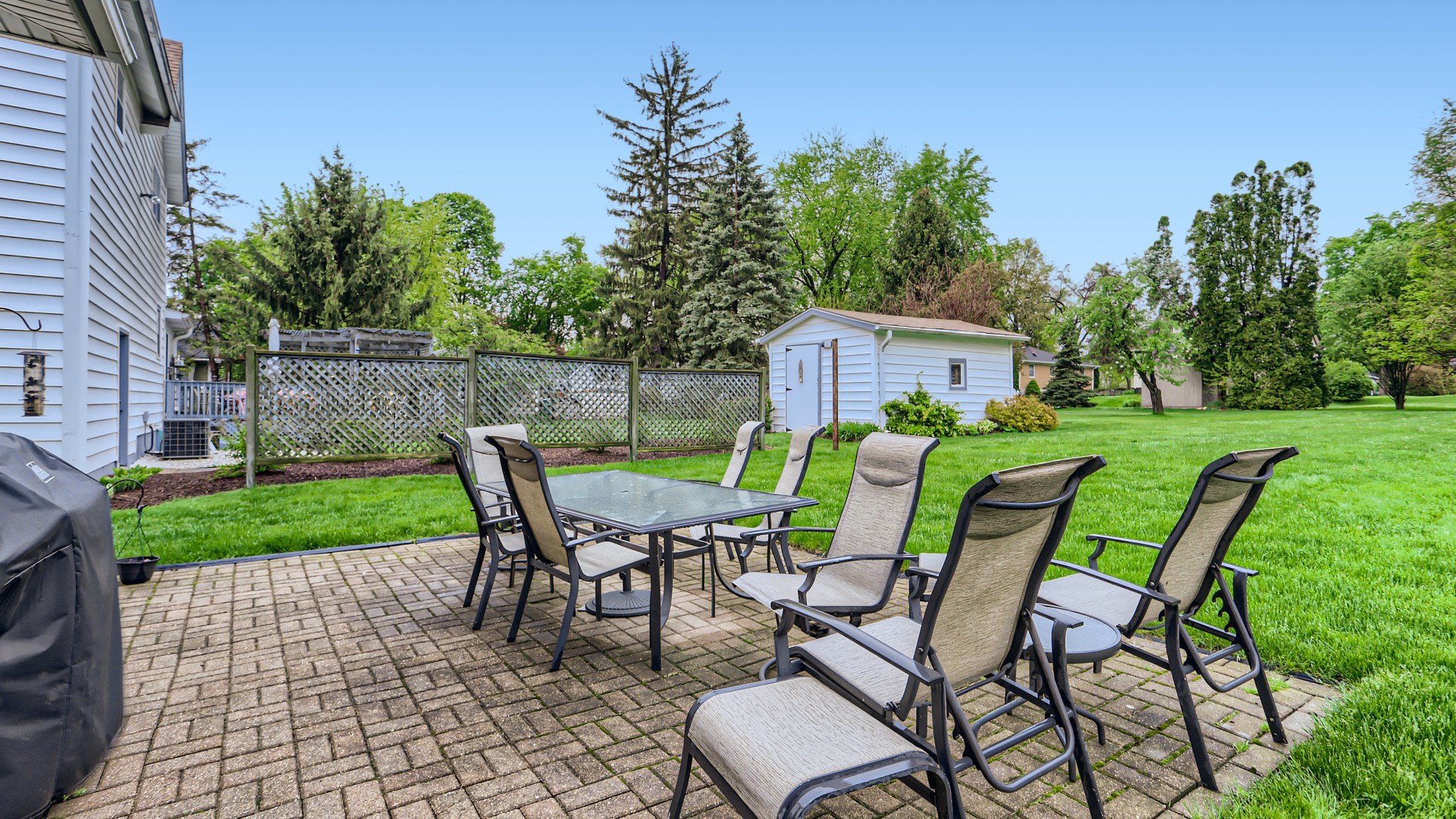 940 Logan Avenue Elgin, IL 60120 - Photo 14 of 16 a view of a chairs and table in patio