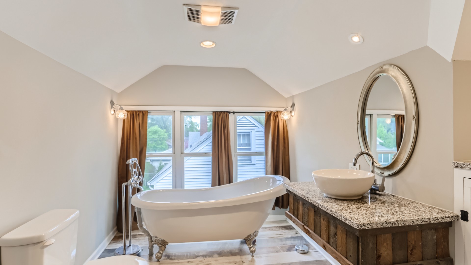 940 Logan Avenue Elgin, IL 60120 - Photo 9 of 16 a living room with furniture and a mirror