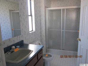 135 Reading Road Salisbury, NC 28147 - Photo 5 of 6 a bathroom with a tub and shower