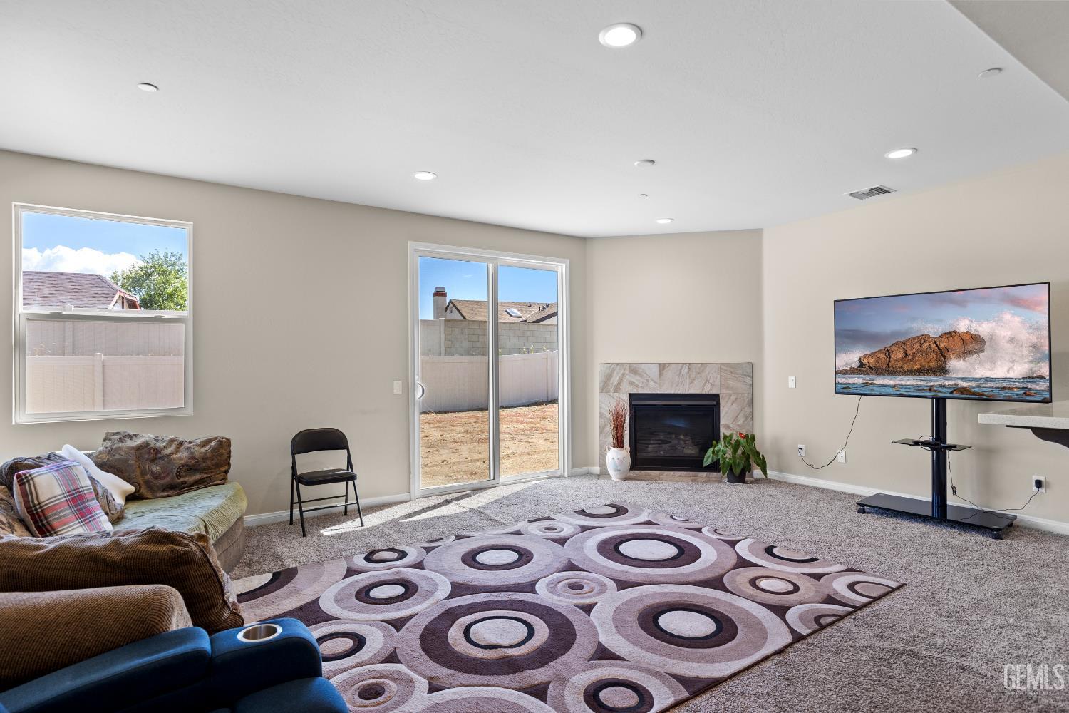 Undisclosed Address Tehachapi, CA 93561 - Photo 17 of 43 a bedroom with furniture and a flat screen tv