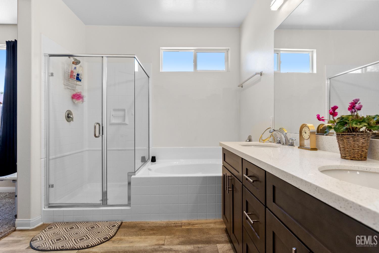 Undisclosed Address Tehachapi, CA 93561 - Photo 33 of 43 a bathroom with a tub sink and mirror
