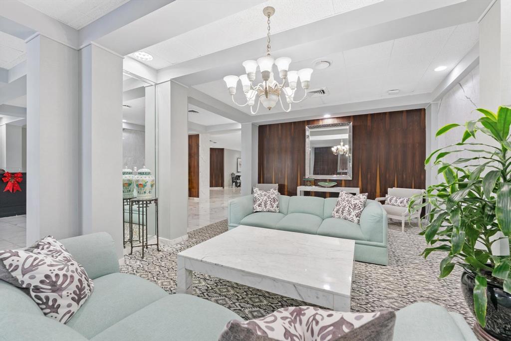 2860 South Ocean Boulevard, Unit 601 Palm Beach, FL 33480 - Photo 4 of 28 a living room with furniture or chandelier and a rug