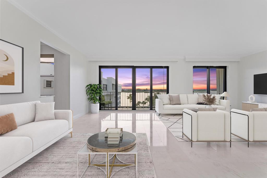 2860 South Ocean Boulevard, Unit 601 Palm Beach, FL 33480 - Photo 7 of 28 a living room with furniture a rug and a large window