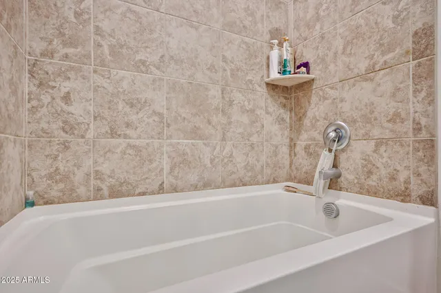 a bathroom with a bathtub