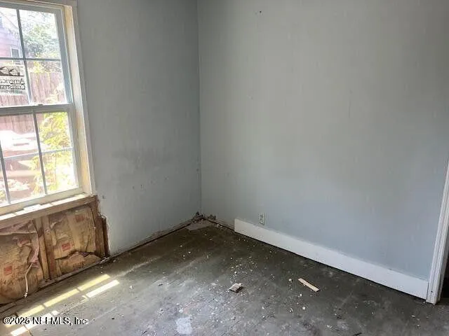 an empty room with a window