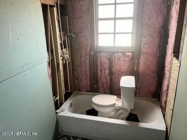 a outdoor view with a sink and a toilet