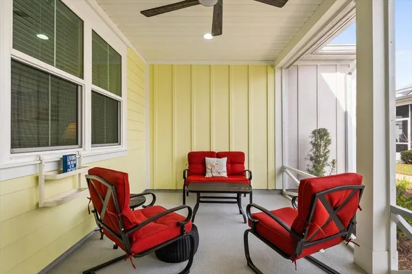 a living room with furniture and a window