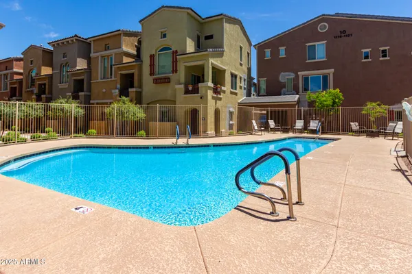 a view of a building with a swimming pool