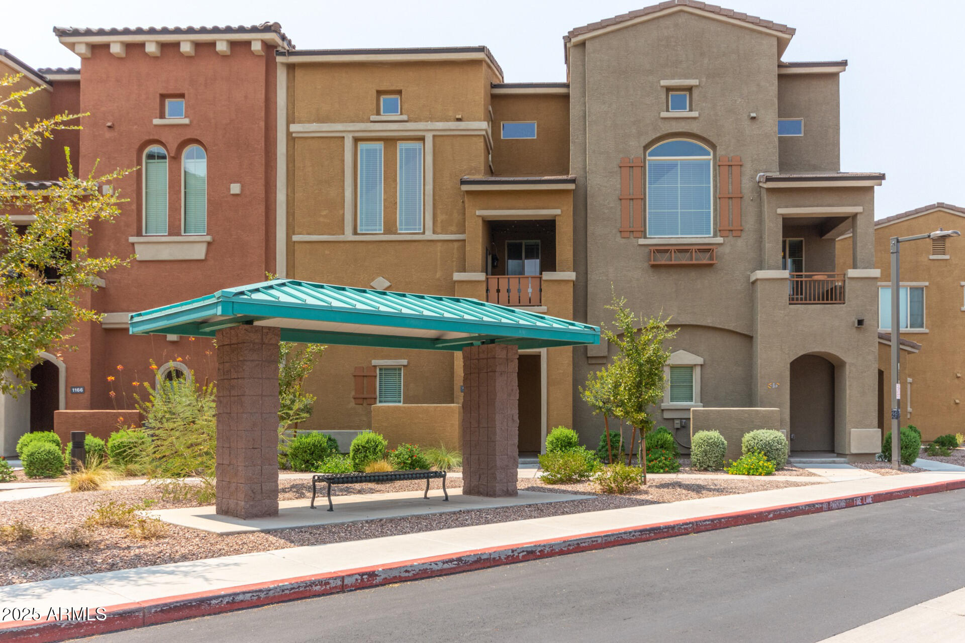 240 West Juniper Avenue, Unit 1010 Gilbert, AZ 85233 - Photo 32 of 46 front view of house with a street
