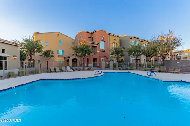 a view of a building with a swimming pool