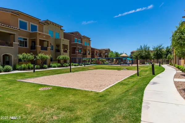 a view of outdoor space with swimming pool and seating