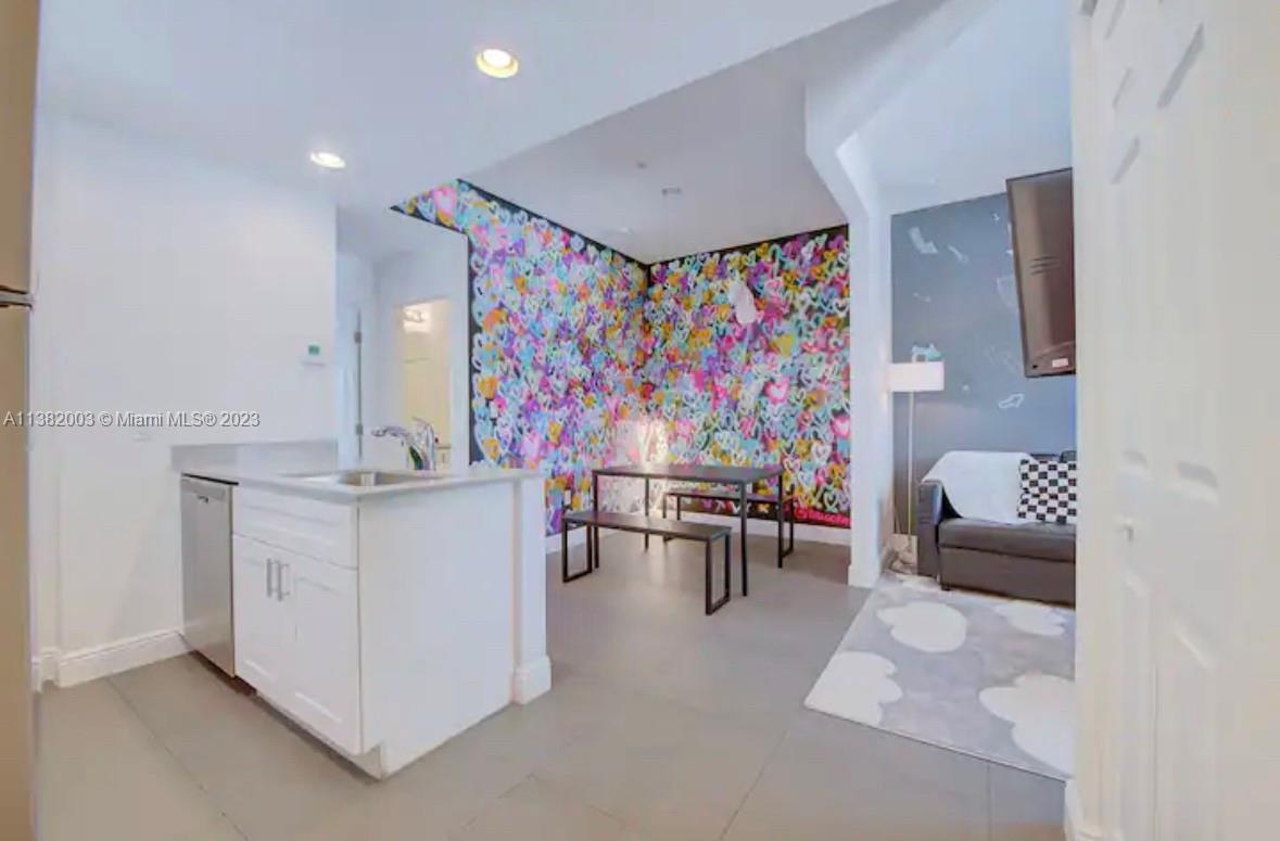 Wynwood Miami, FL 33127 - Photo 2 of 16 a view of kitchen with furniture and rug