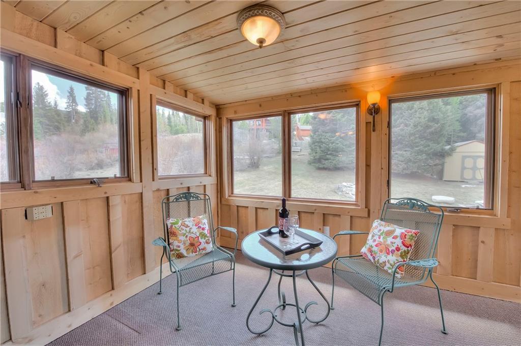 898 Deer Path Road Dillon, CO 80435 - Photo 12 of 34 a living room with furniture and a large window