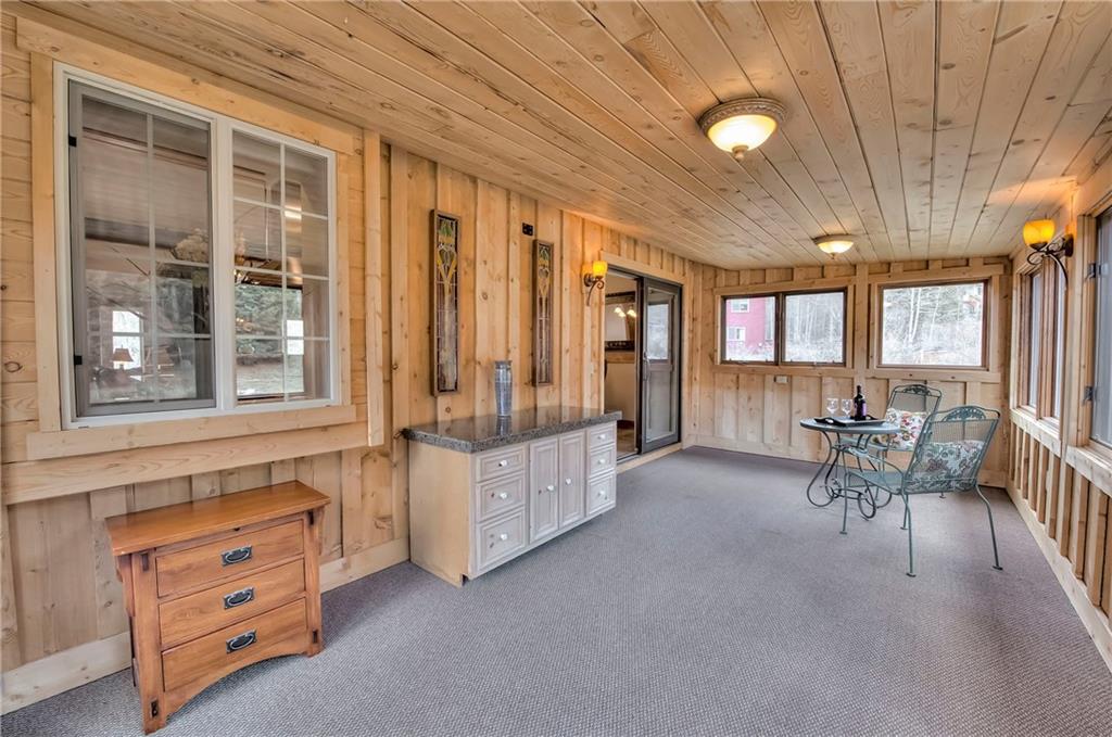 898 Deer Path Road Dillon, CO 80435 - Photo 14 of 34 a view of an empty room with furniture and a window