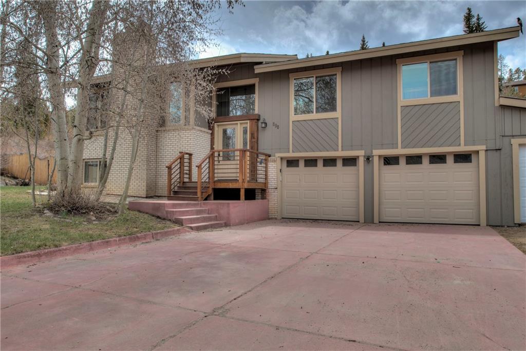 898 Deer Path Road Dillon, CO 80435 - Photo 31 of 34 a view of a house with backyard