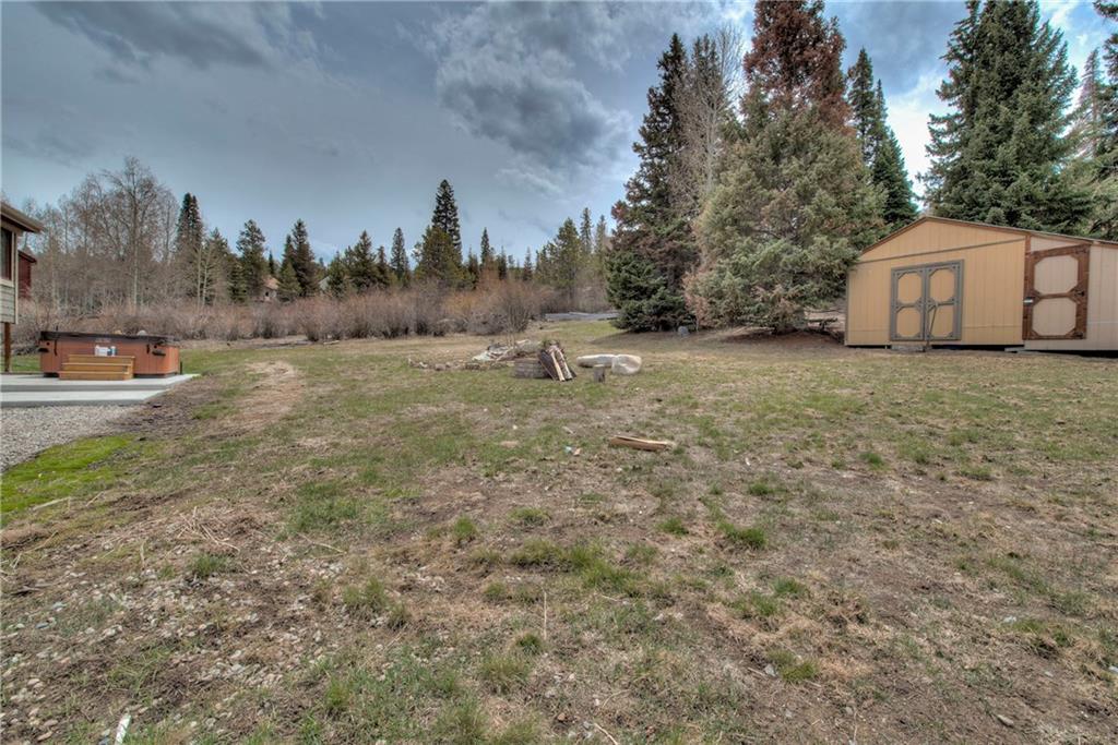 898 Deer Path Road Dillon, CO 80435 - Photo 34 of 34 a view of a dry yard with trees