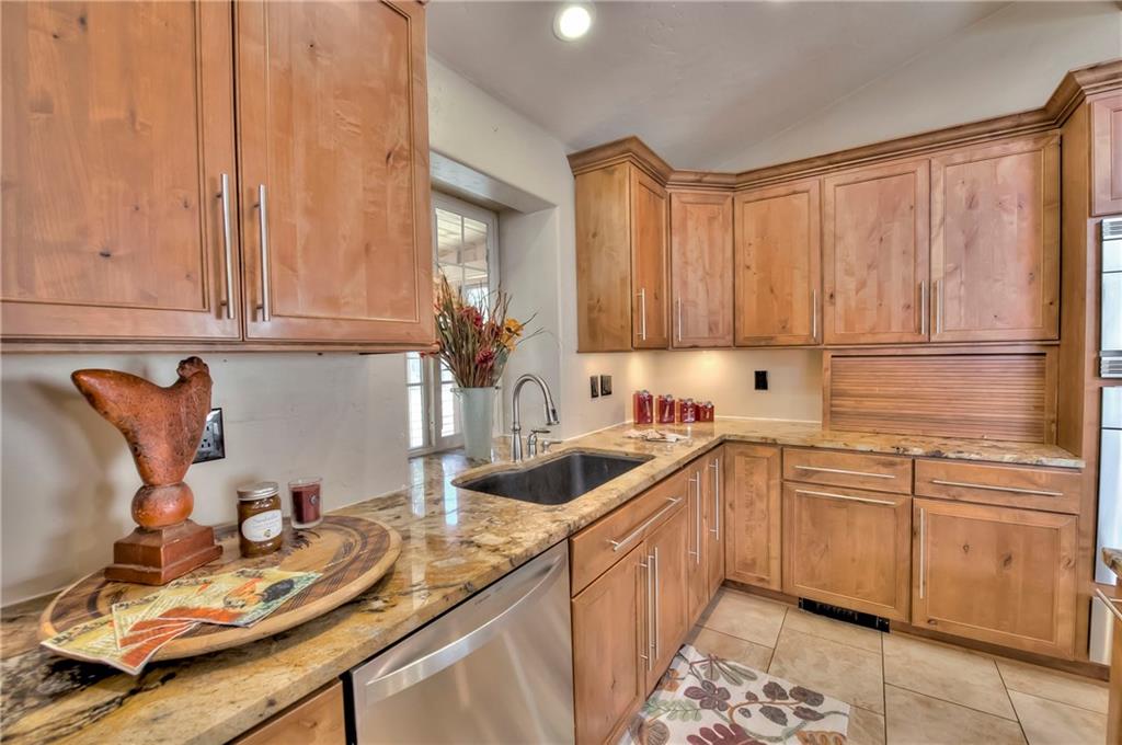 898 Deer Path Road Dillon, CO 80435 - Photo 5 of 34 a kitchen with a sink and cabinets