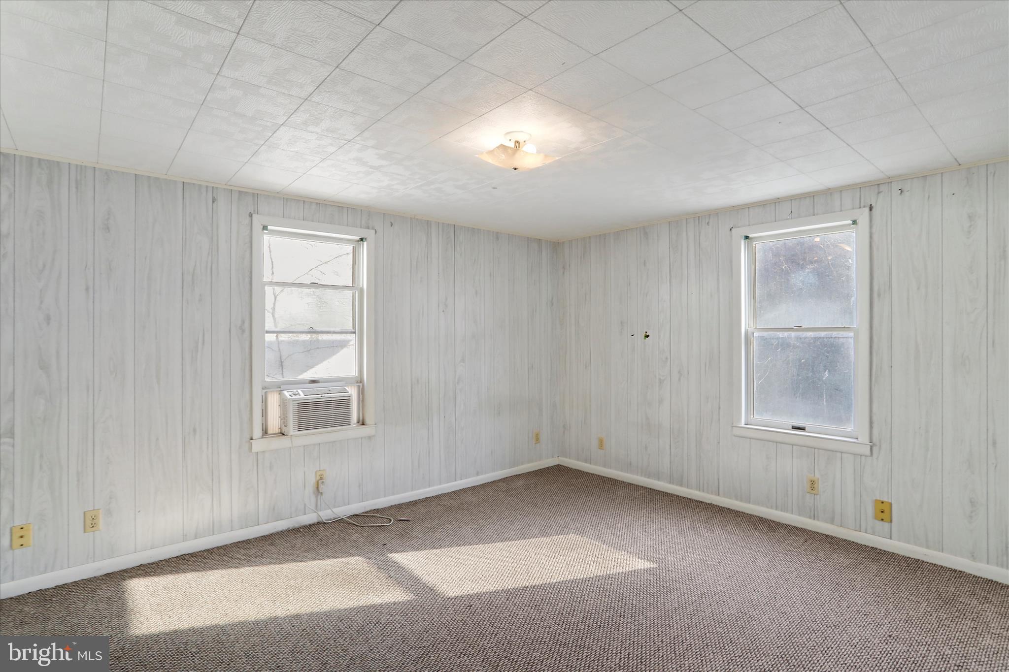 574 South Water Street Keyser, WV 26726 - Photo 17 of 25 an empty room with windows