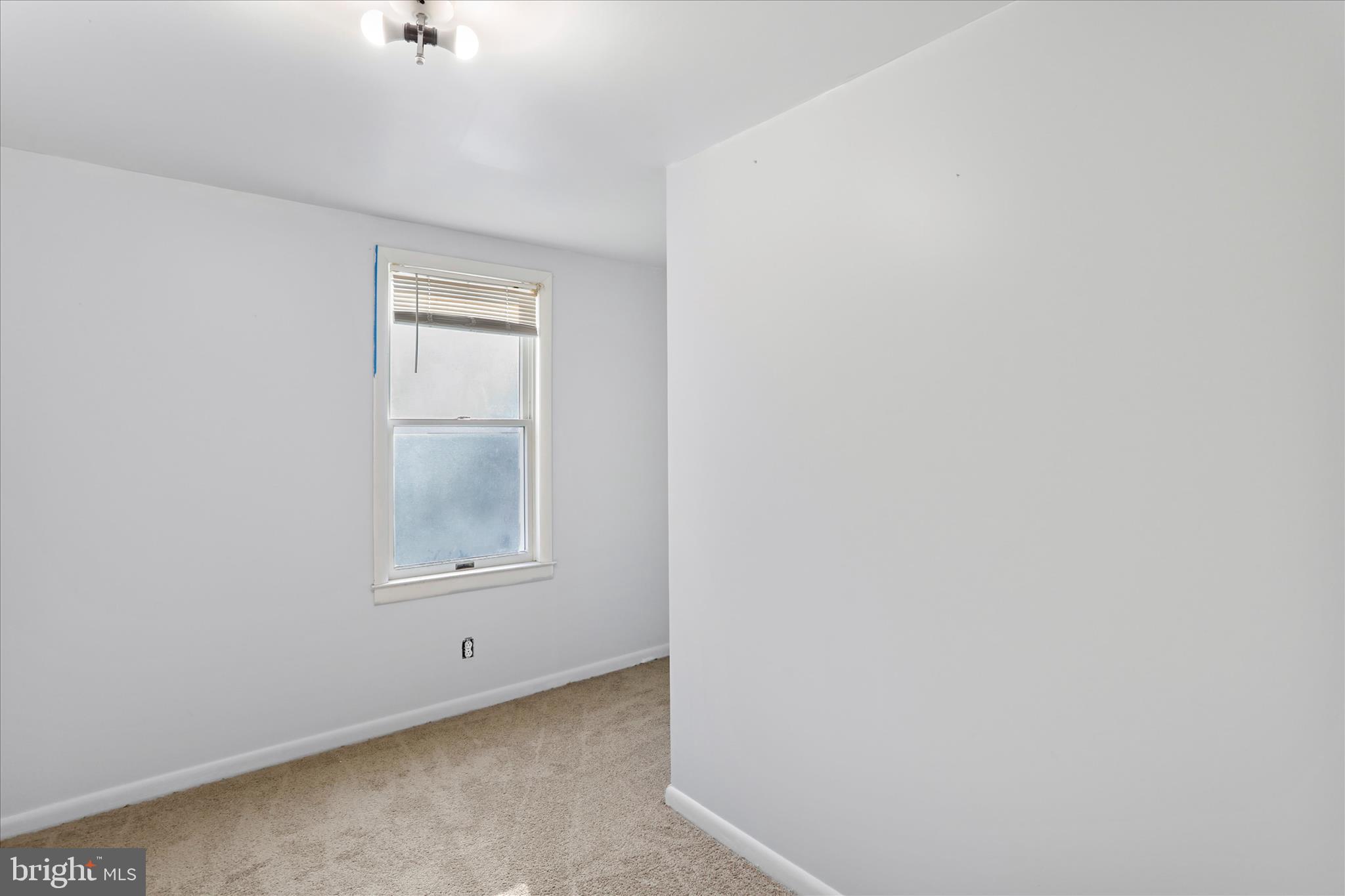 574 South Water Street Keyser, WV 26726 - Photo 19 of 25 an empty room with a window