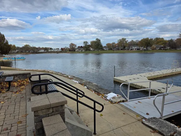 a view of a lake with houses next to a lake
