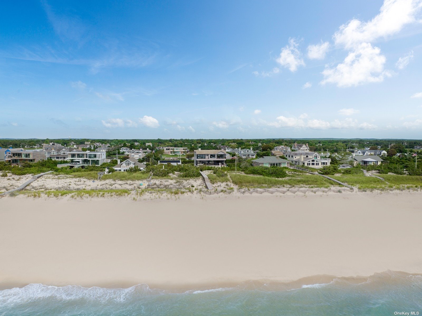 98 Dune Road Quogue, NY 11959 - Photo 1 of 1 a view of an ocean and beach