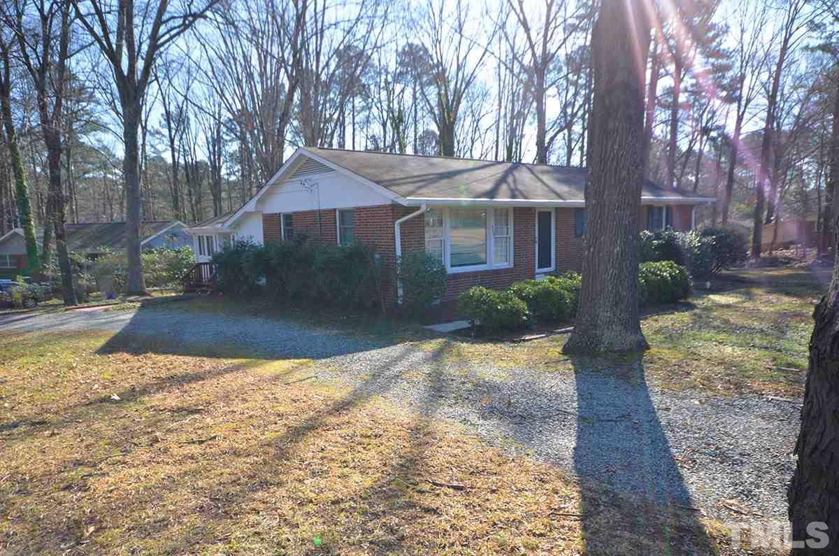 4905 Revere Road Durham, NC 27713 - Photo 2 of 24 a view of a house with a yard