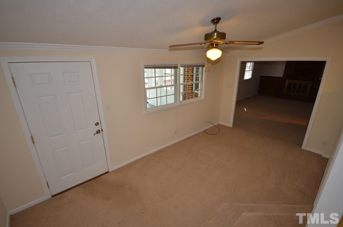 4905 Revere Road Durham, NC 27713 - Photo 16 of 24 a view of an empty room with a window