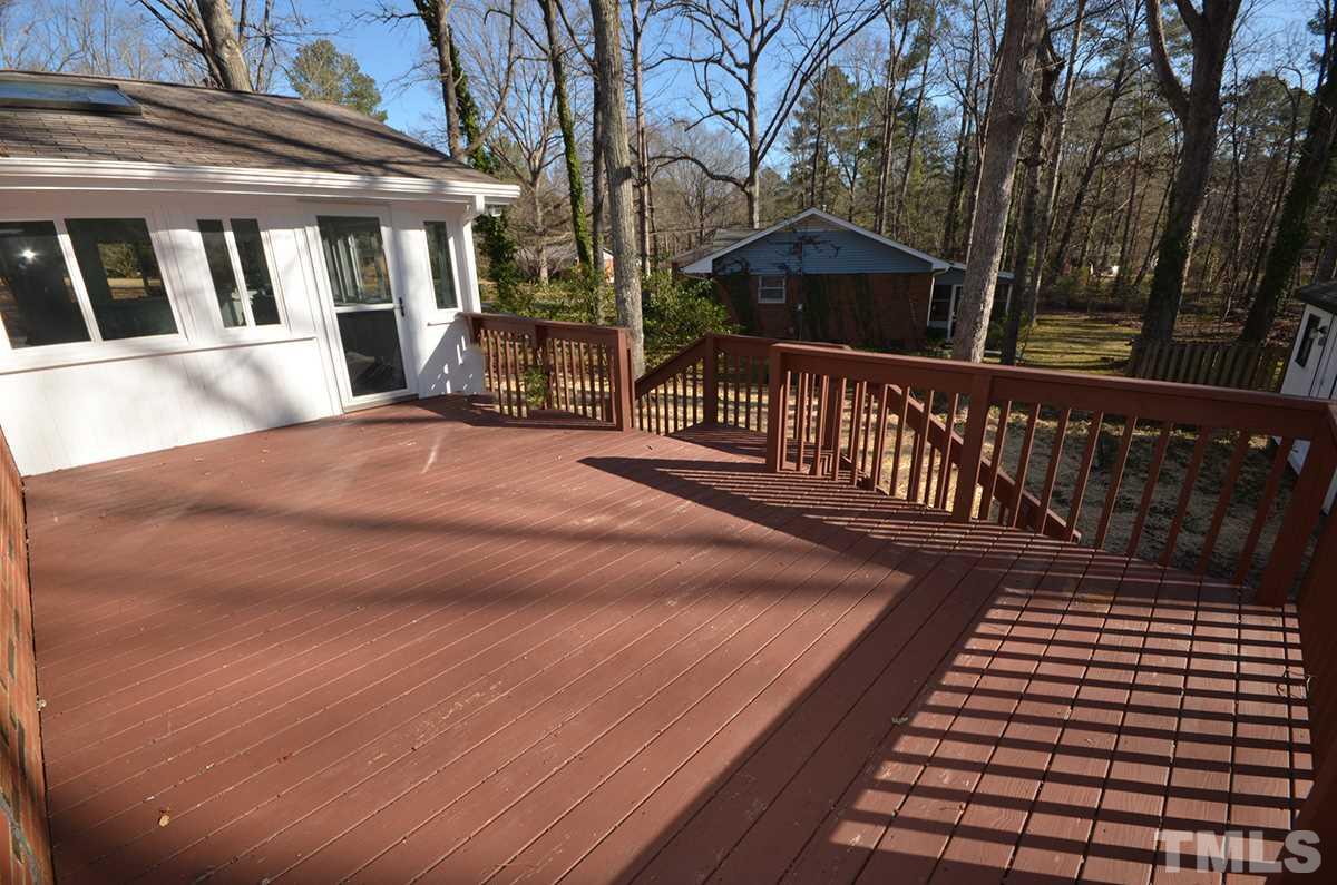 4905 Revere Road Durham, NC 27713 - Photo 20 of 24 a view of a brick house with wooden floor