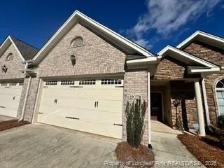 a view of a house with a garage