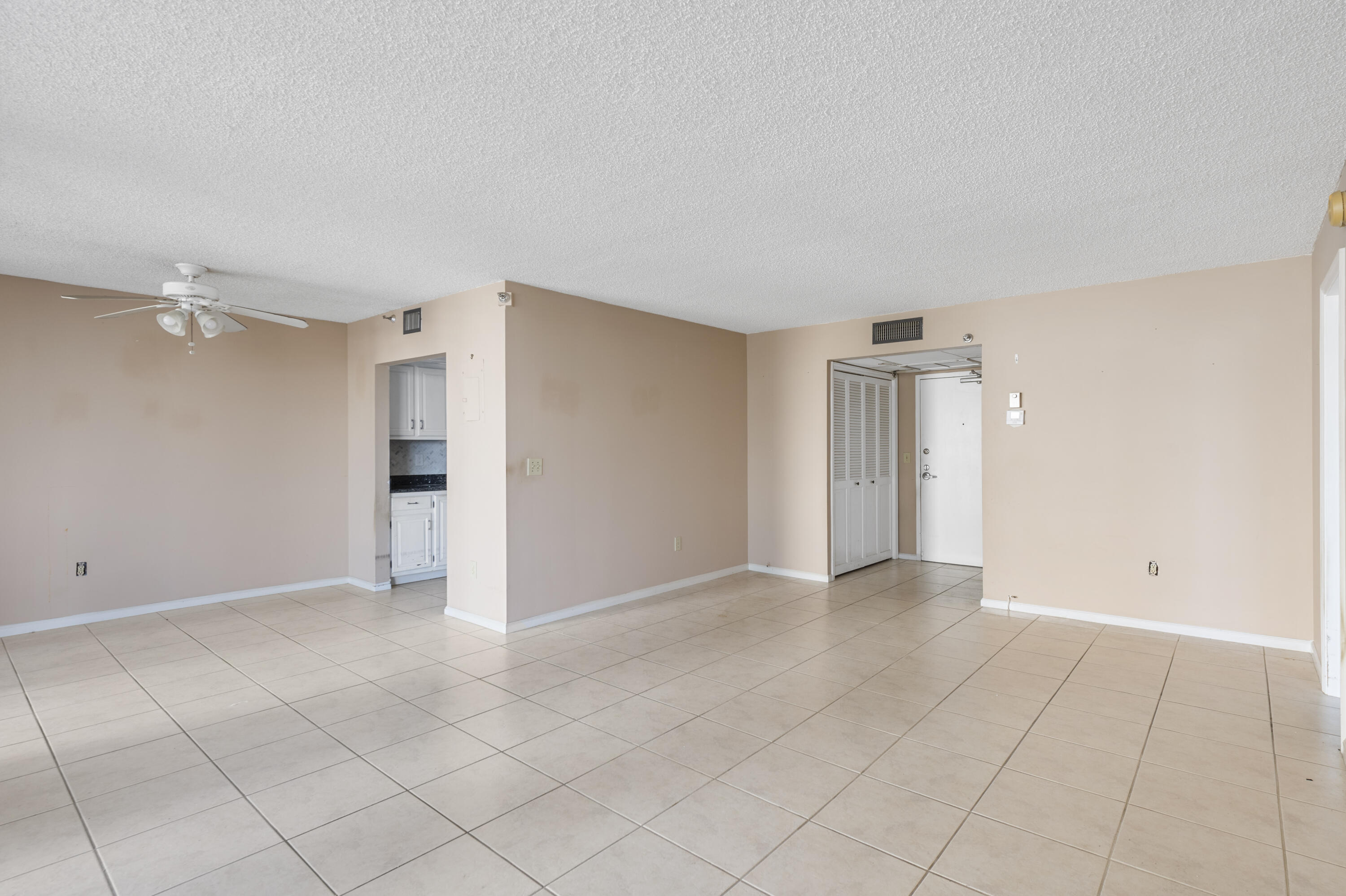 859 Jeffery Street, Unit 312 Boca Raton, FL 33487 - Photo 8 of 53 a view of an empty room and window