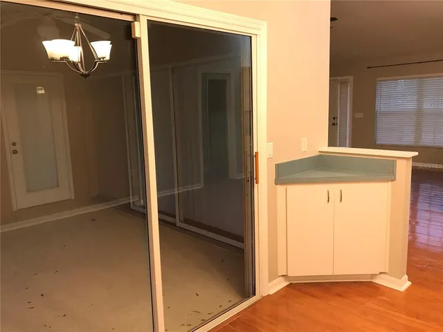 an empty room with a door