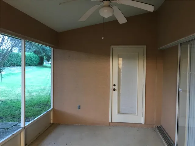 a view of an empty room and window