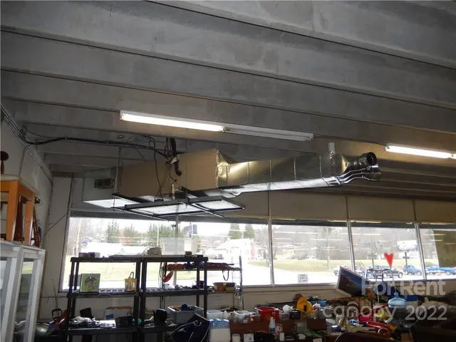 a room with furniture and a wooden floor