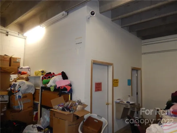 a room with furniture and a window