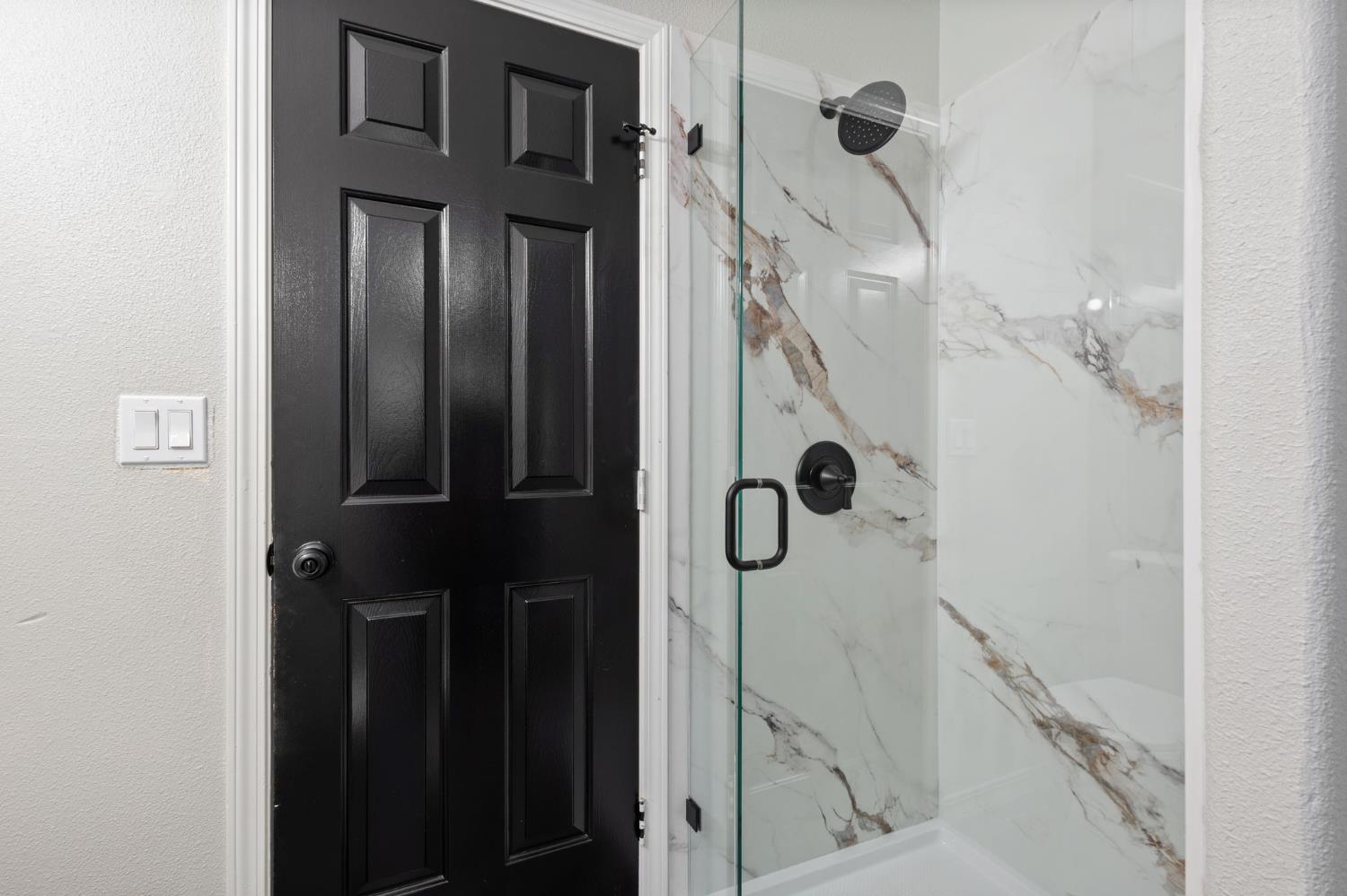 7300 Saltgrass Way Elk Grove, CA 95758 - Photo 20 of 35 a bathroom with a shower