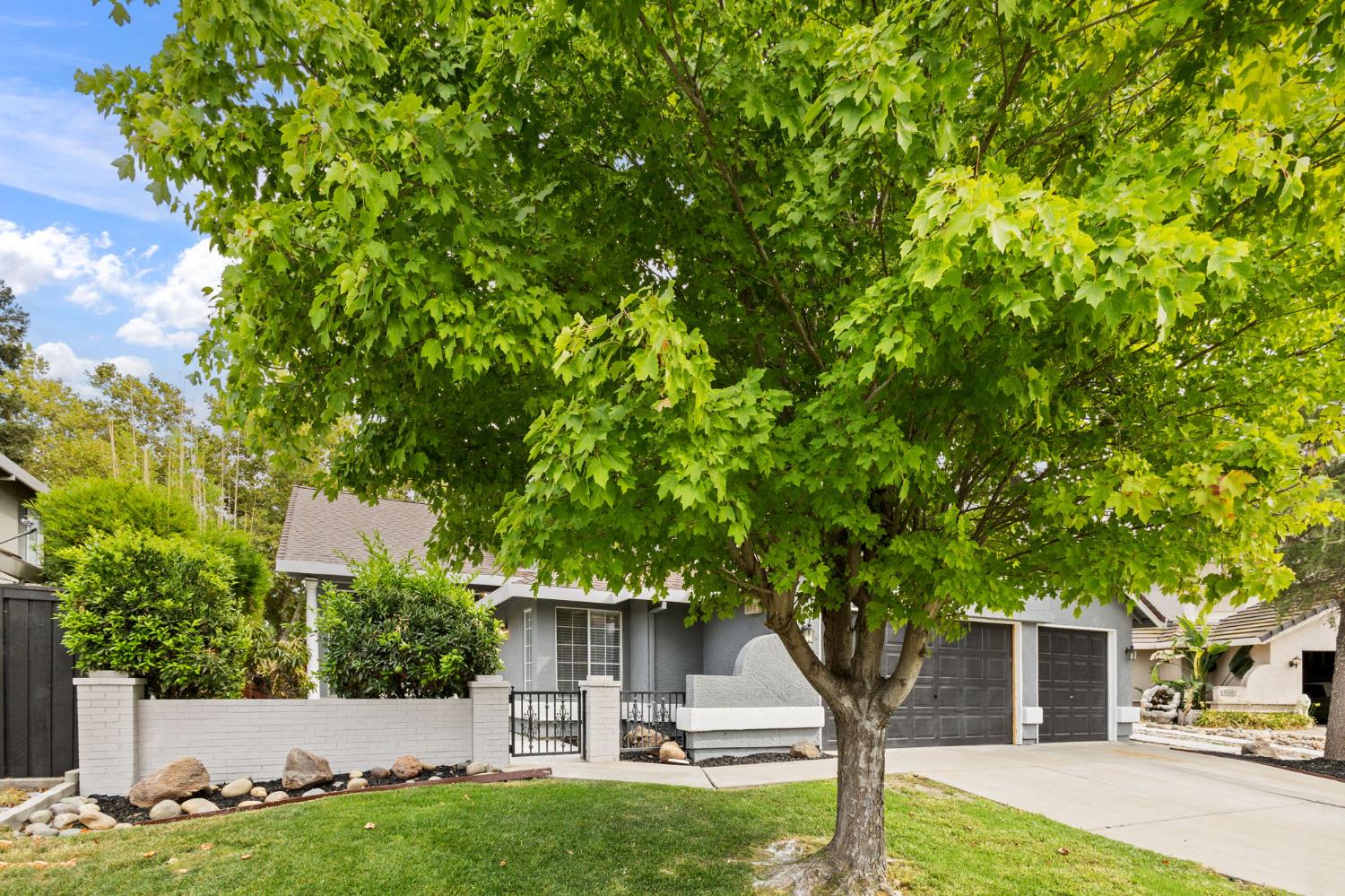 7300 Saltgrass Way Elk Grove, CA 95758 - Photo 2 of 35 a front view of a house with garden