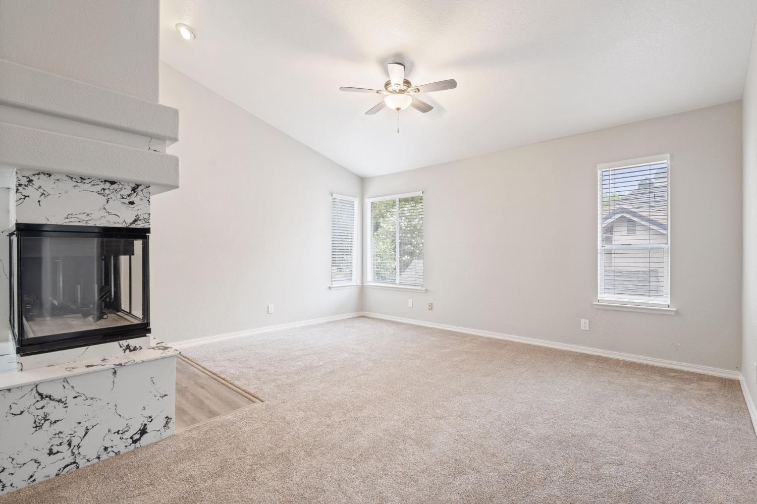 7300 Saltgrass Way Elk Grove, CA 95758 - Photo 27 of 35 a view of an empty room with window and cabinet