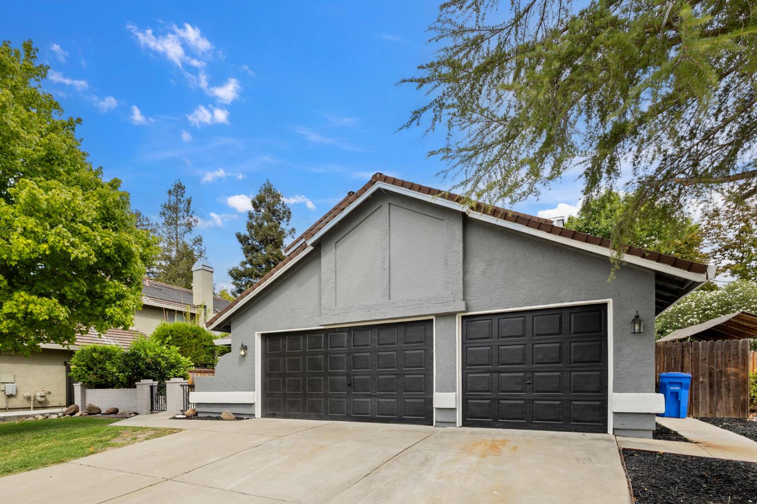 7300 Saltgrass Way Elk Grove, CA 95758 - Photo 3 of 35 a front view of a house with a garage