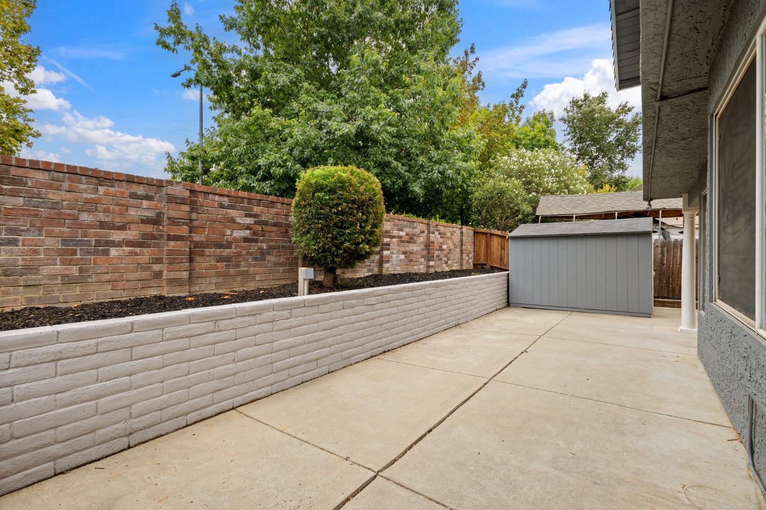 7300 Saltgrass Way Elk Grove, CA 95758 - Photo 35 of 35 a view of backyard and tree