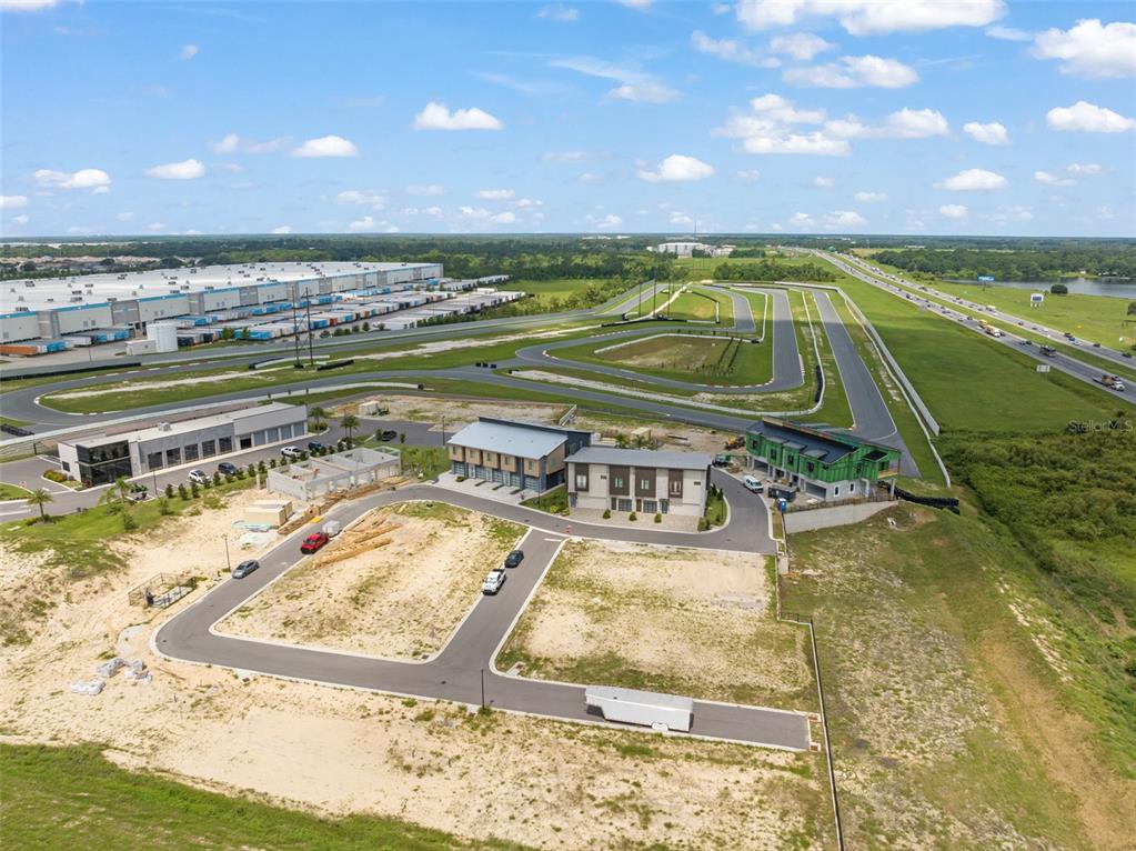 396 Chicane Circle, Unit 5 Auburndale, FL 33823 - Photo 16 of 62 a view of a swimming pool and an outdoor space