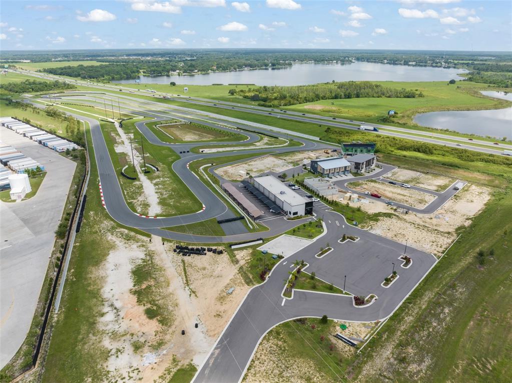 396 Chicane Circle, Unit 5 Auburndale, FL 33823 - Photo 18 of 62 an aerial view of a house with a big yard