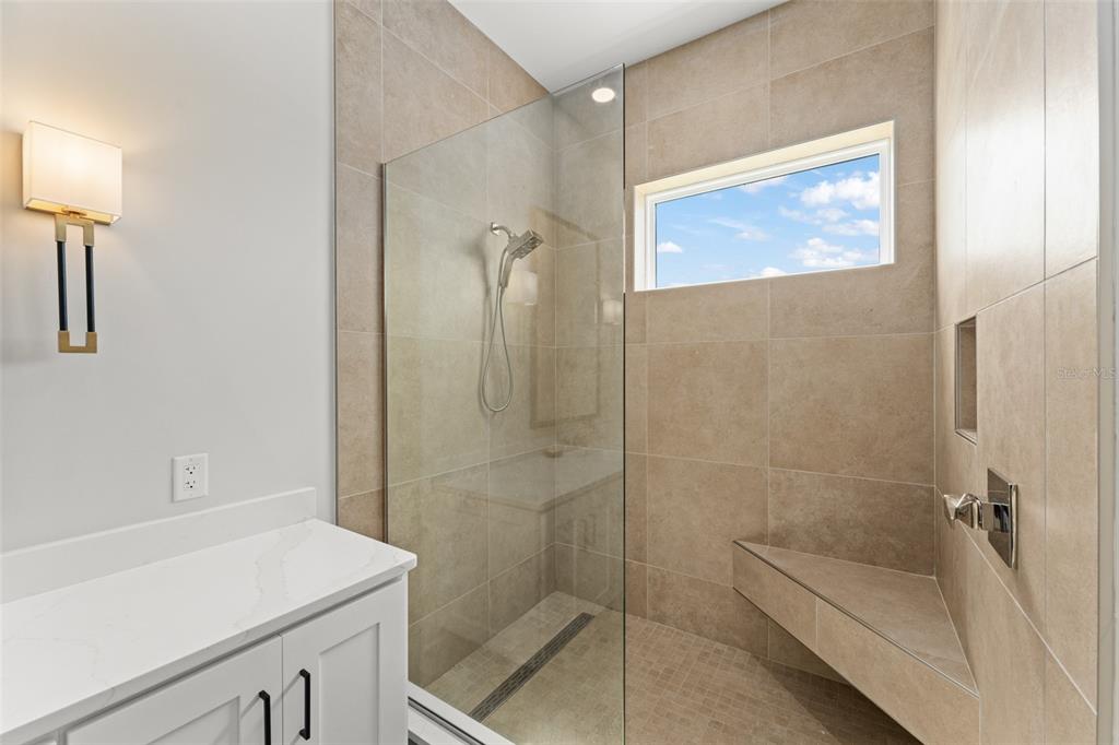 396 Chicane Circle, Unit 5 Auburndale, FL 33823 - Photo 23 of 62 a bathroom with a sink a toilet and shower