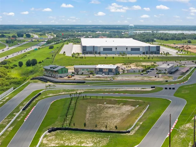 a bedroom with bed and a lamp