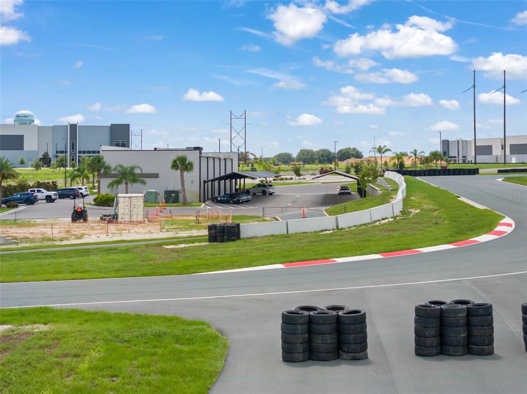 396 Chicane Circle, Unit 5 Auburndale, FL 33823 - Photo 27 of 62 a view of a swimming pool and a terrace